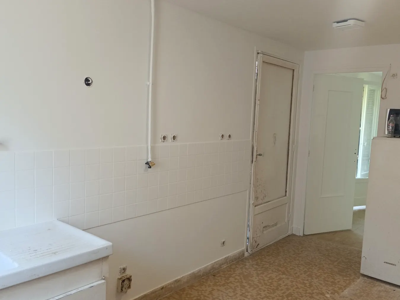 Photo réelle de rénovation intérieure BN BÂTIMENT : Après peinture · Détail cuisine