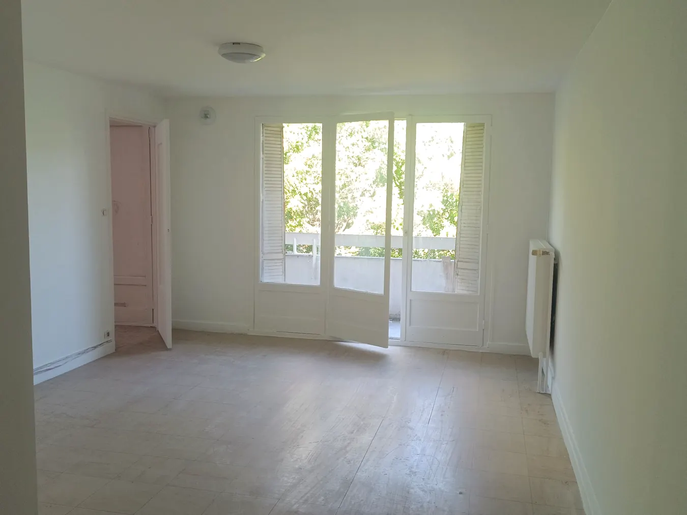 Photo réelle de rénovation intérieure BN BÂTIMENT : Après peinture · Séjour